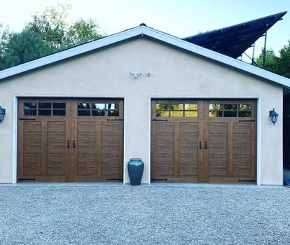 Robinson Garage Doors custom cedar-tone wood carriage garage doors installed in Central Oregon