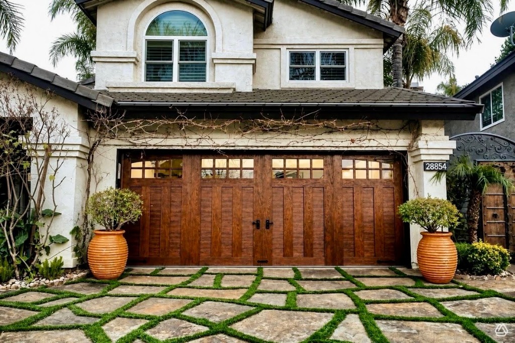 Canyon Ridge Carriage House 5-Layer garage door in Medium Oak on residential home in Bend Oregon